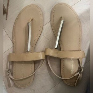 Beige sandals with silver hardware